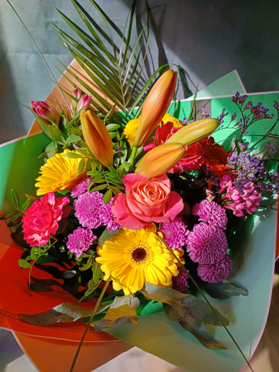 Multicolored bouquet. - Multicolored composition in the box.