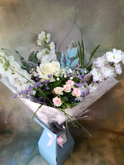 Royal Delphinium - Pastel bouquet of roses and delphiniums.